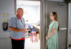 UGA student Cassidy Head learned about the health care landscape in Pulaski County as an Elizabeth V. Wight Southwest Georgia intern. Here, she talks with Kevin Justice, a registered technologist in radiography and PACS (Picture Archiving and Communication System) administrator at Taylor Regional. (Photo by Baker Owens)